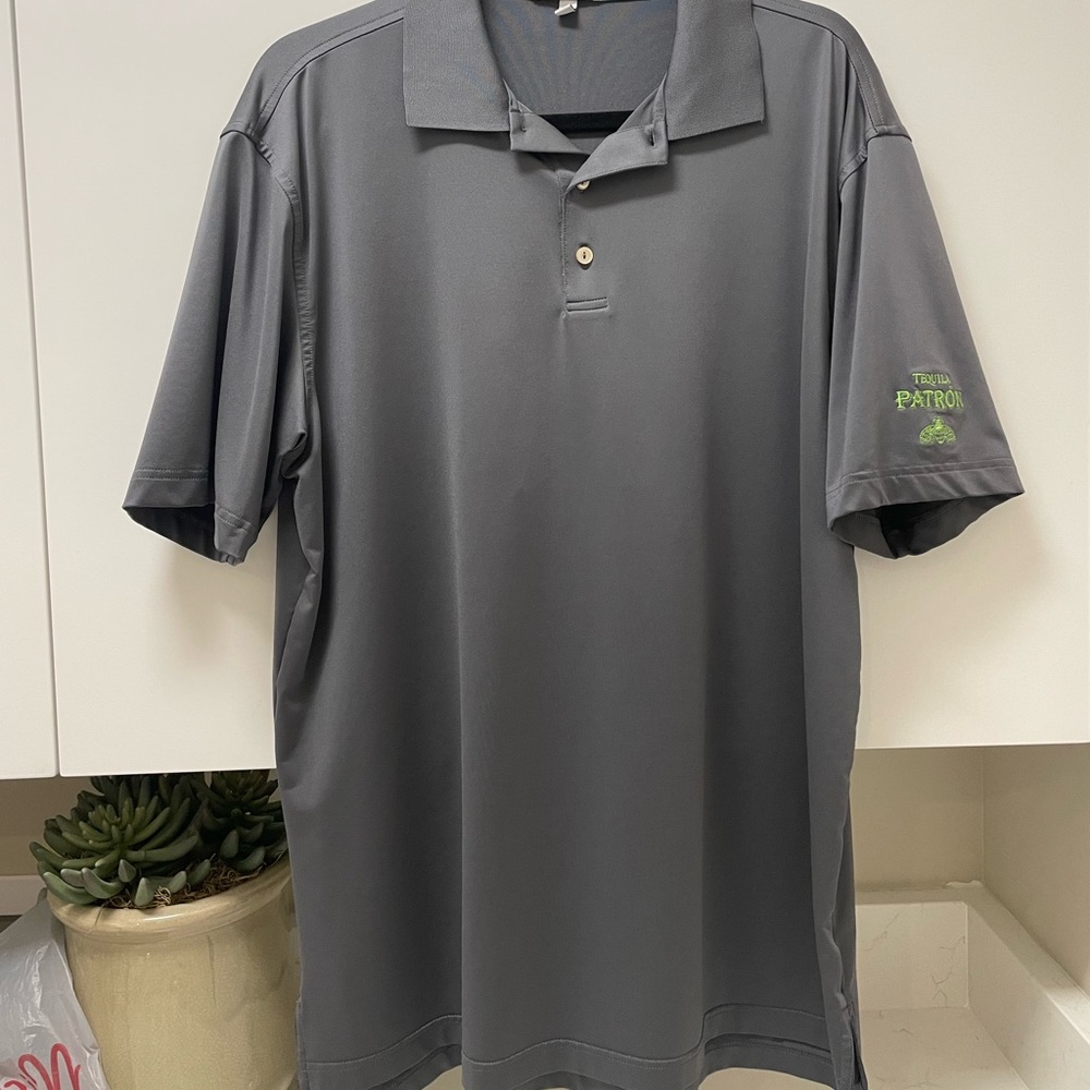Peter Millar polo with Patron Tequila logo on sleeve